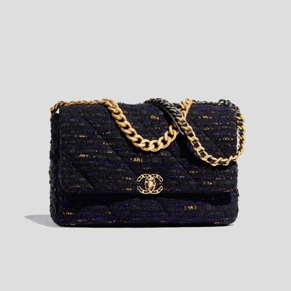 Authentic Tweed Ribbon Medium Chanel 19. This bag has no visible signs of wear.